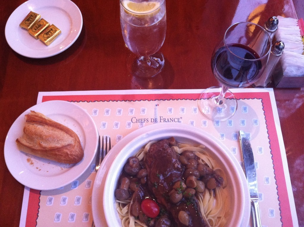 Les Chef de France Epcot Beef Short Rib Pasta braised in Cabernet with pearl onions and mushrooms. Photo copyright ThemeParkHipster. One of the best Restaurants at Epcot.