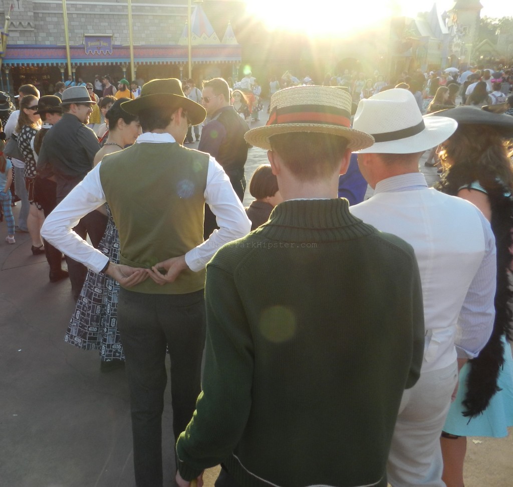 Waiting for pics at the carousel in Fantasyland. Keep reading to get the best Dapper Day tips at Disney! 