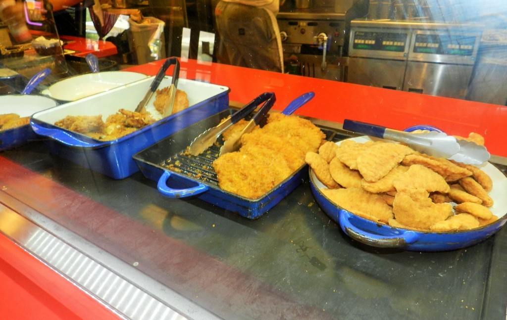 Springfield workers preparing the delicious delights at Cletus Chicken Shack in Universal Studios Florida