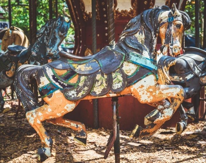 Abandoned amusement park carousel ride. Keep reading about The Goosebumps Amusement Park One Day at Horrorland.