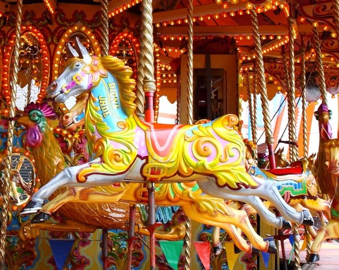 Amusement park carousel ride with horses. Keep reading about The Goosebumps Amusement Park One Day at Horrorland.