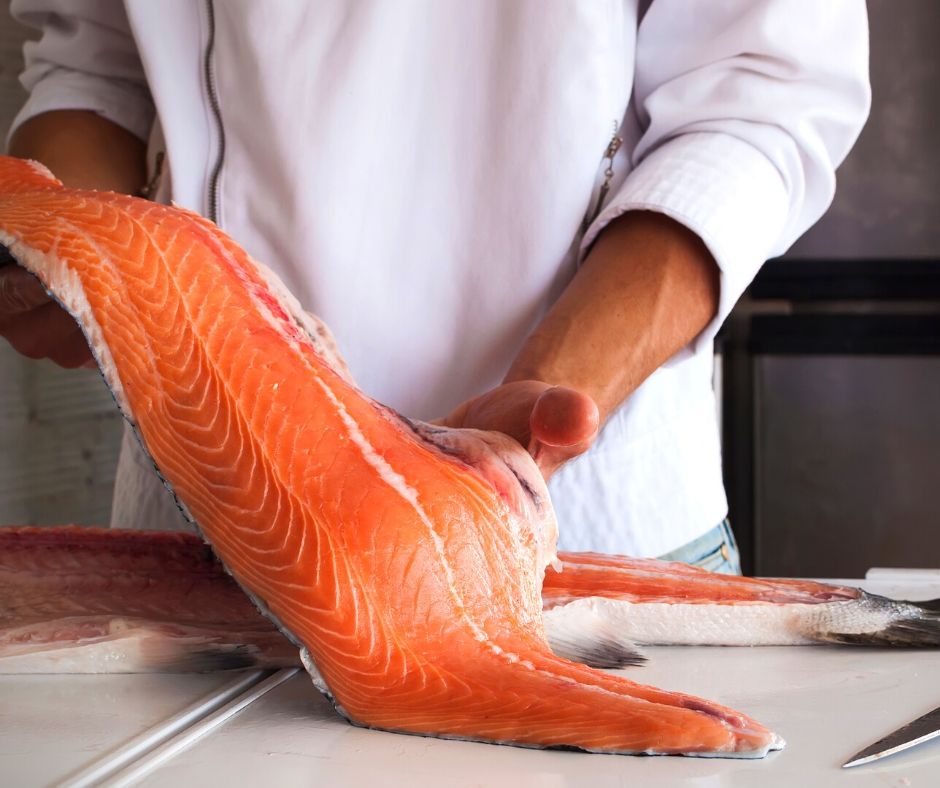 Alaska Copper River Salmon held by chef