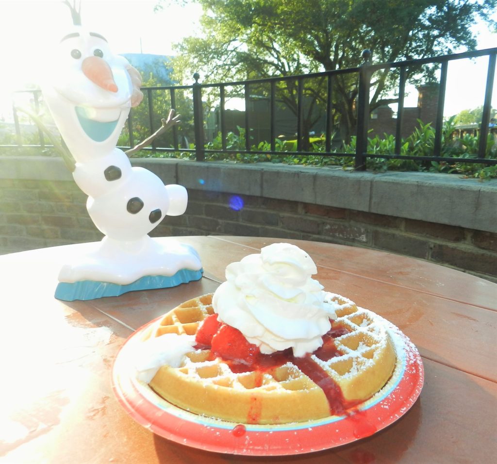 Disney Dining Waffles at Sleepy Hallow with Olaf from Frozen. Keep reading the get the worst and best snacks at Disney World.