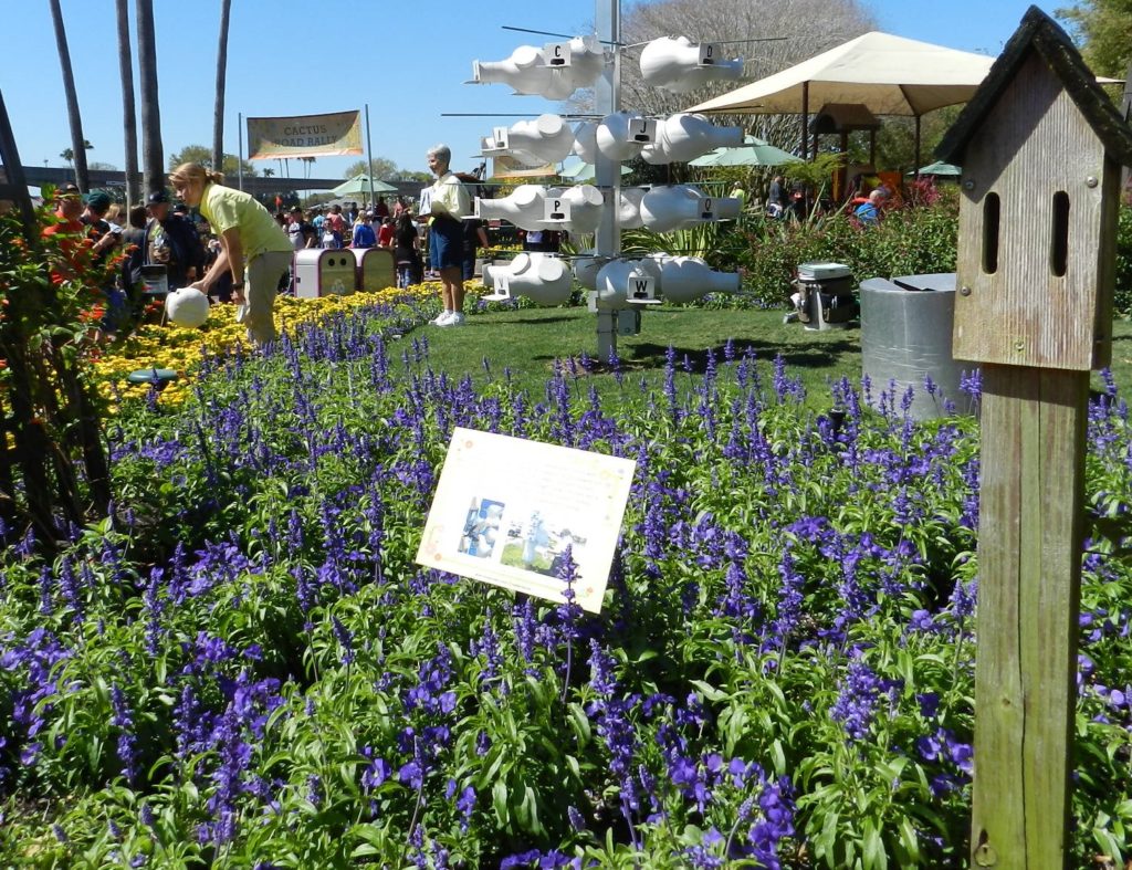 Purple Flower Garden at the Epcot Flower and Garden Festival 2016. Keep reading to see the best epcot flower and garden topiaries through the years!