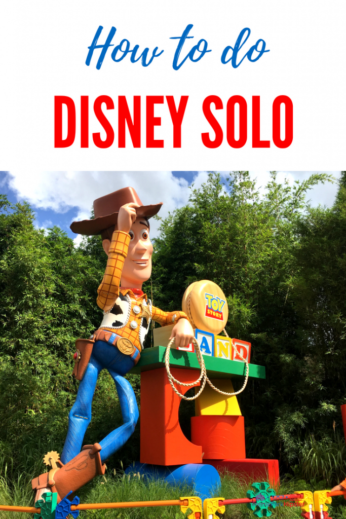 Theme Park Travel Guide to doing Walt Disney World Solo with Woody of Toy Story Land greeting you.