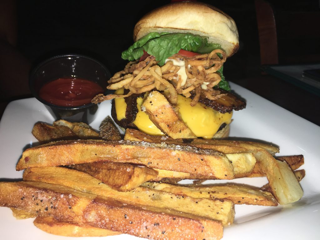 19 reasons you'll love CLC Regal Oaks. Juicy burger with fries. Photo copyright ThemeParkHipster.