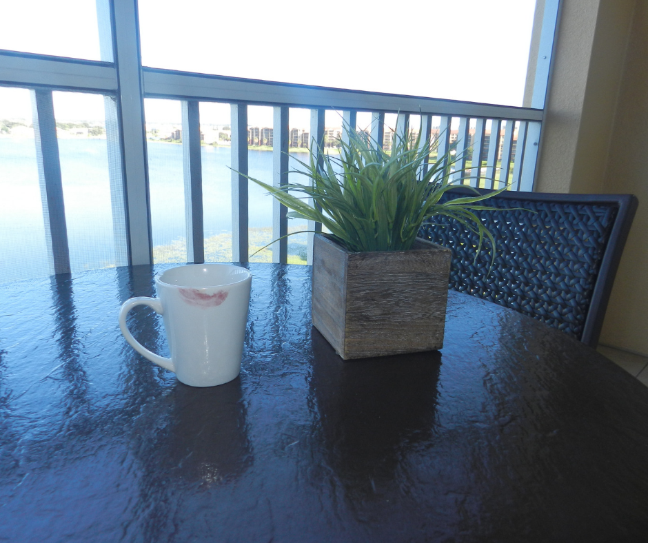 Westgate Lakes Resort Villa Orlando. Balcony with view of Big Sand Lake and nice cup of coffee. Photo copyright ThemeParkHipster.