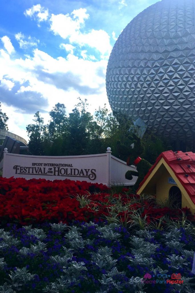 Epcot International Festival of the Holidays 27 Entrance Holiday Decor Pluto Topiary