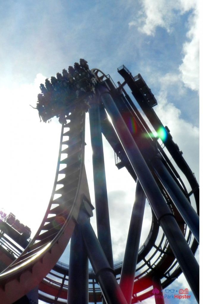 Sheikra roller coaster at Busch Gardens with People Hanging in the Air in the Florida sun. Keep reading to get the Groupon Busch Gardens Tampa Deals.