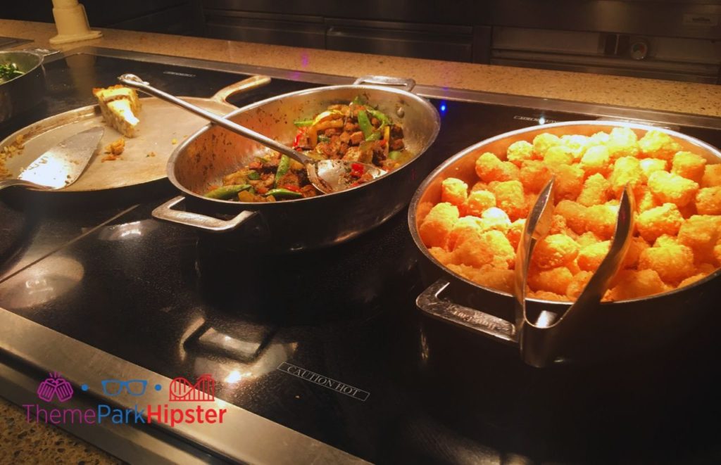 Disney Buffet Restaurant Cape May tater tots making it one of the Best Buffet in Disney World.. Keep reading to find out what is the best buffet in Disney World. 