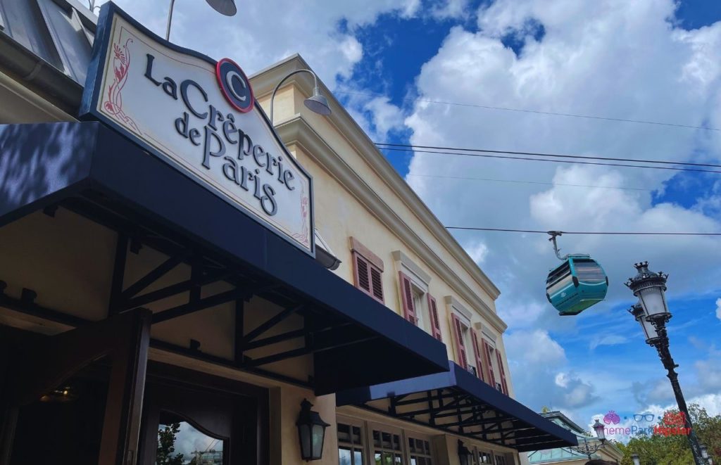 La Creperie de Paris Entrance at Disney Epcot. Keep reading to get the full Remy's Ratatouille Adventure Guide: Photos, Secrets, Food and more!