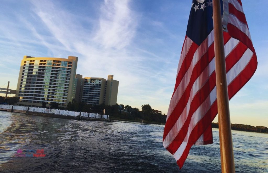 Contemporary Resort View from Boat in Lake Buena Vista Florida. Keep reading to get the full guide to Disney Wilderness Lodge Christmas activities.