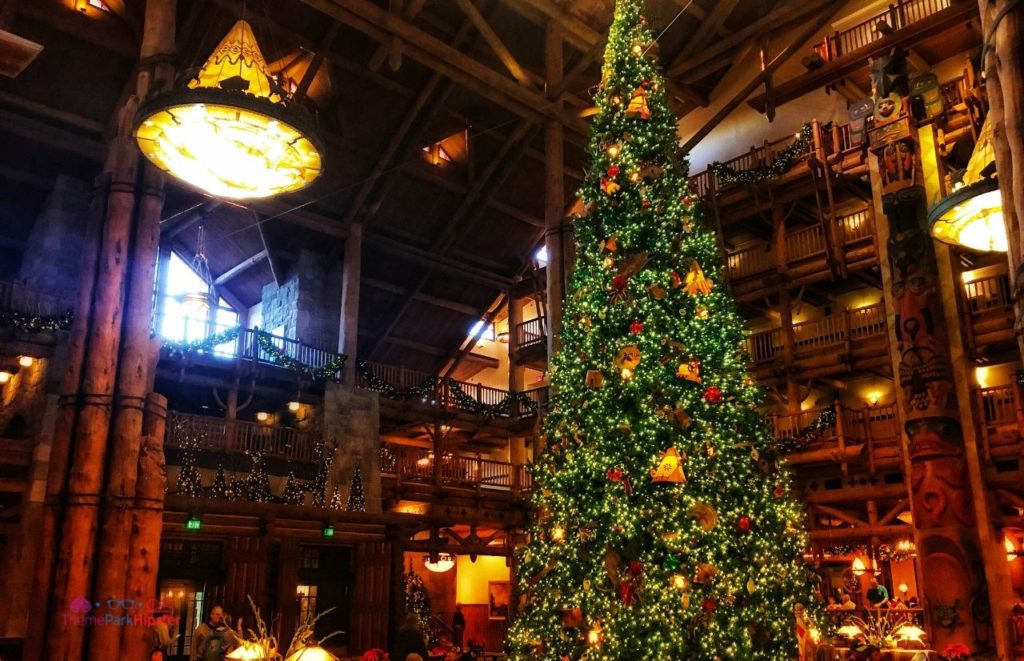 Large Christmas Tree in Disney Wilderness Lodge. Keep reading to learn about the best things to do at Disney World for Christmas. Photo copyright ThemeParkHipster.