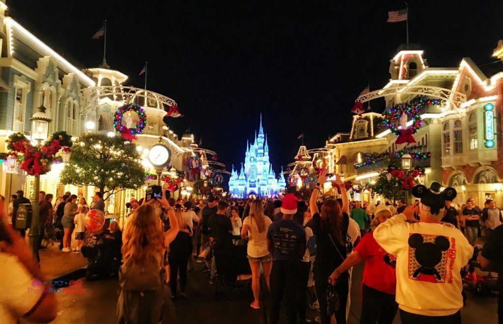 Shimmering Cinderella Castle with Christmas Lights at the Magic Kingdom. Keep reading to learn about the best things to do at Disney World for Christmas.