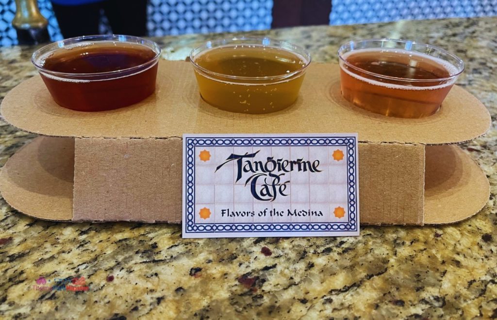 Epcot International Festival of the Arts 2022 Tangerine Cafe Flavors of Medina in Morocco with Cider Flight. Keep reading to learn more about which Orlando theme park is the best. 