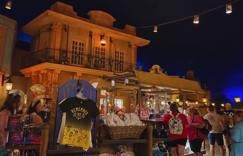 Epcot Mexico Pavilion Twilight Shopping Area with Coco Remember Me Shirt