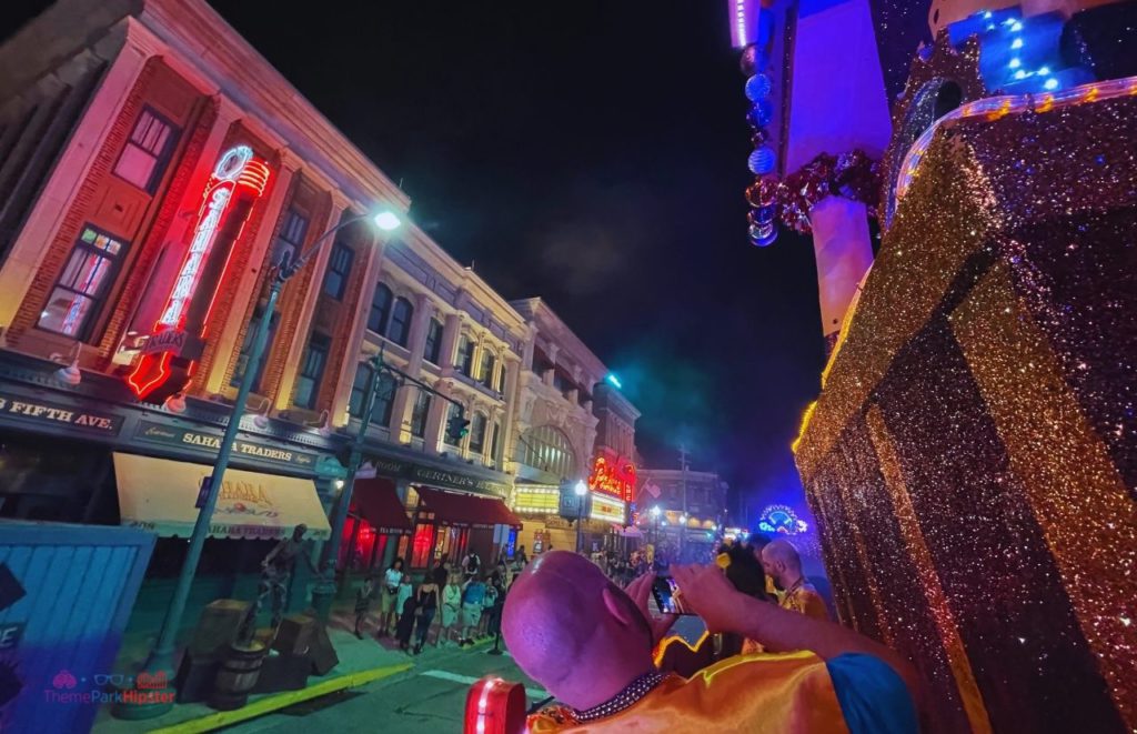 Machine Float in Universal Studios Mardi Gras Parade in front of the Mummy ride construction Sahara Traders