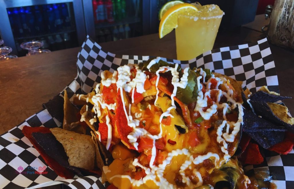 SeaWorld Orlando Loaded Nachos and Margarita at Flamecraft Bar. One of the Foods at SeaWorld Orlando and The Best Things to EAT.