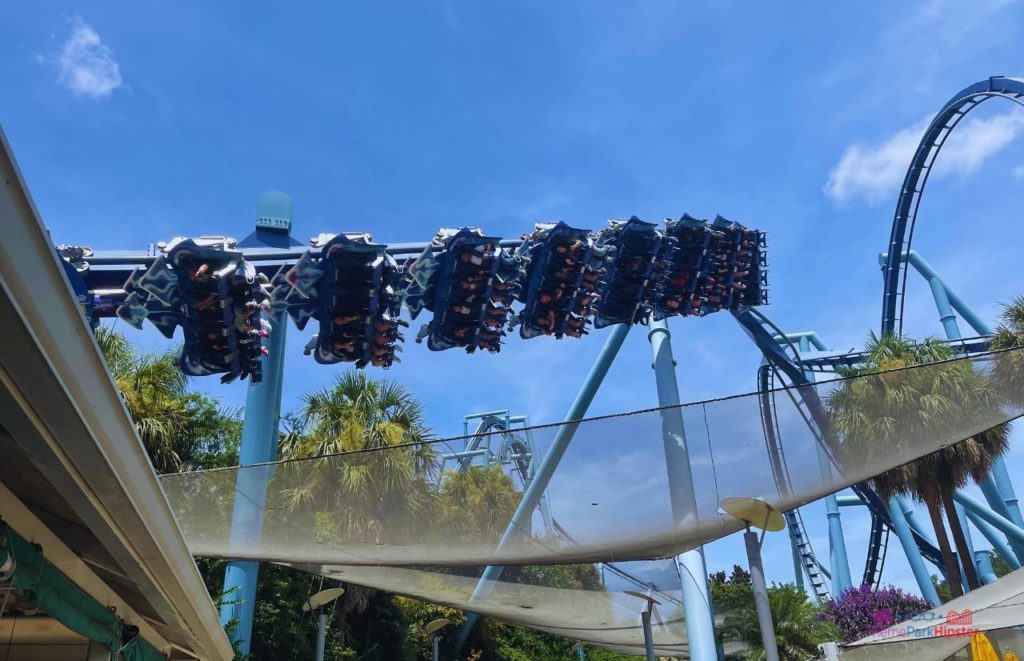 SeaWorld Orlando Manta Rollercoaster flying over in the sky. Keep reading to get your ultimate solo theme park planning guide.