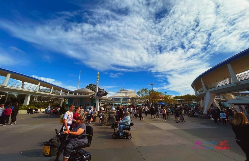 Disney Magic Kingdom Tomorrowland Wide view with Peoplemover and Space Mountain. Keep reading to figure out which is better for Space Mountain Disneyland vs Disney World.