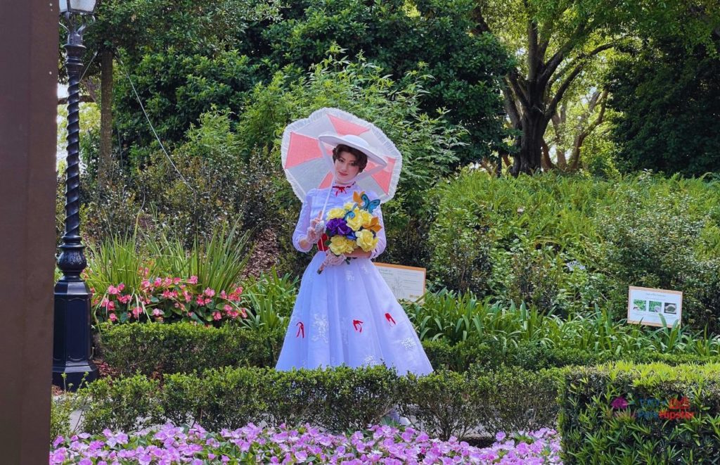 Epcot Flower and Garden Festival Mary Poppins in UK Pavilion. Keeping reading to learn about doing Epcot for adults and Disney for grown-ups.