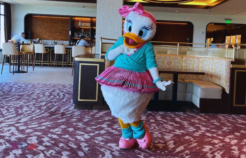 Topolino’s Terrace at Disney’s Riviera Resort Daisy Duck at Character Dining. Keep reading to learn How to Find the BEST Disney Travel Agent and Why You NEED One!