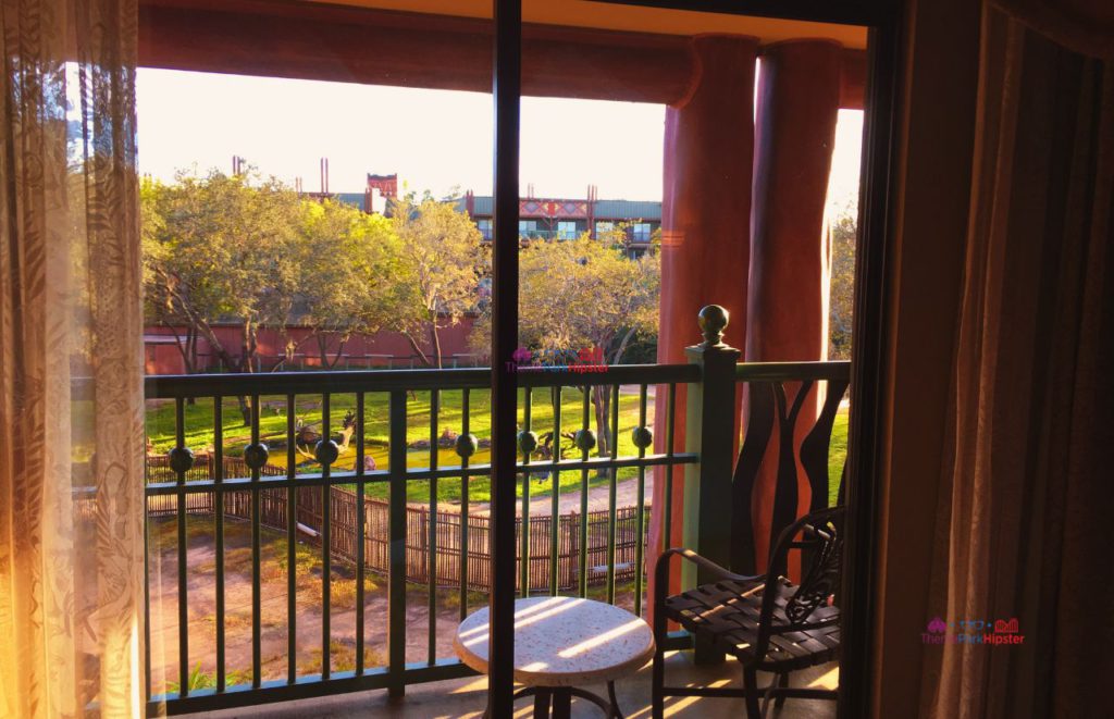 Animal Kingdom Lodge safari view from bedroom. Keep reading to find out the most romantic resorts for couples at Walt Disney World.  