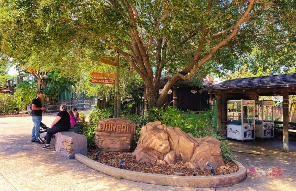 Busch Gardens Tampa Bay Jungala entrance with a theme park guests resting in the shade. Keep reading to learn more about Busch Gardens Tampa animals.