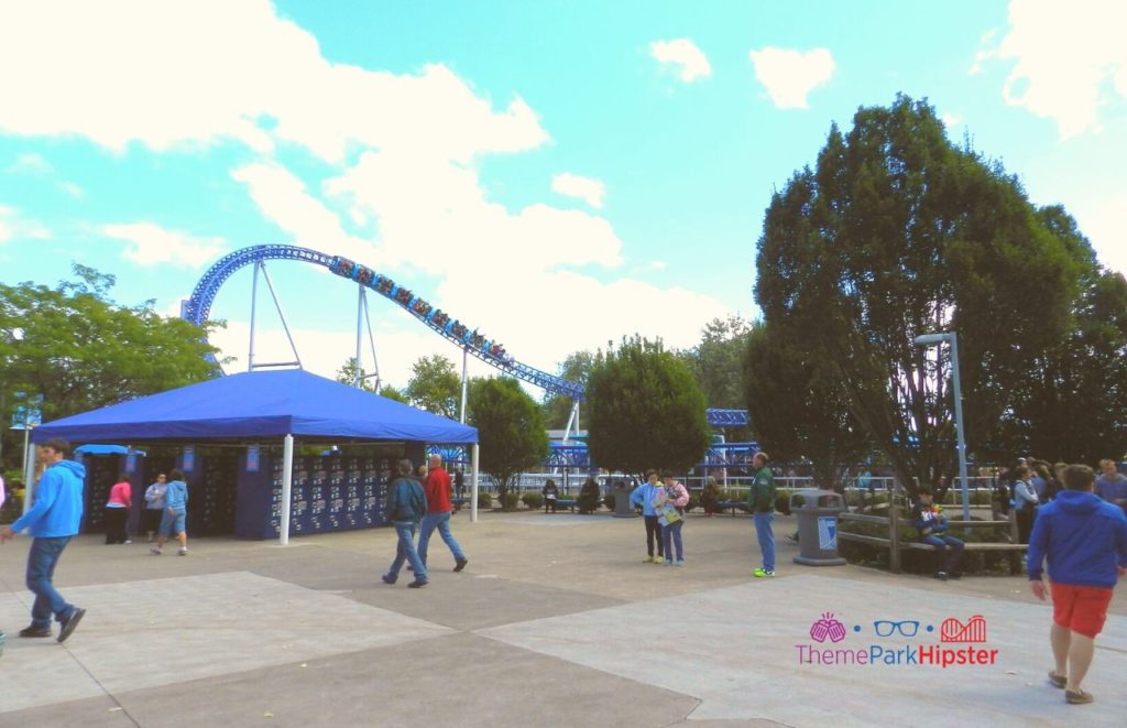 Cedar Point Millennium Force roller coaster going over the curve. Keep reading to get the full guide on the Cedar Point Season Pass Benefits and Cost.