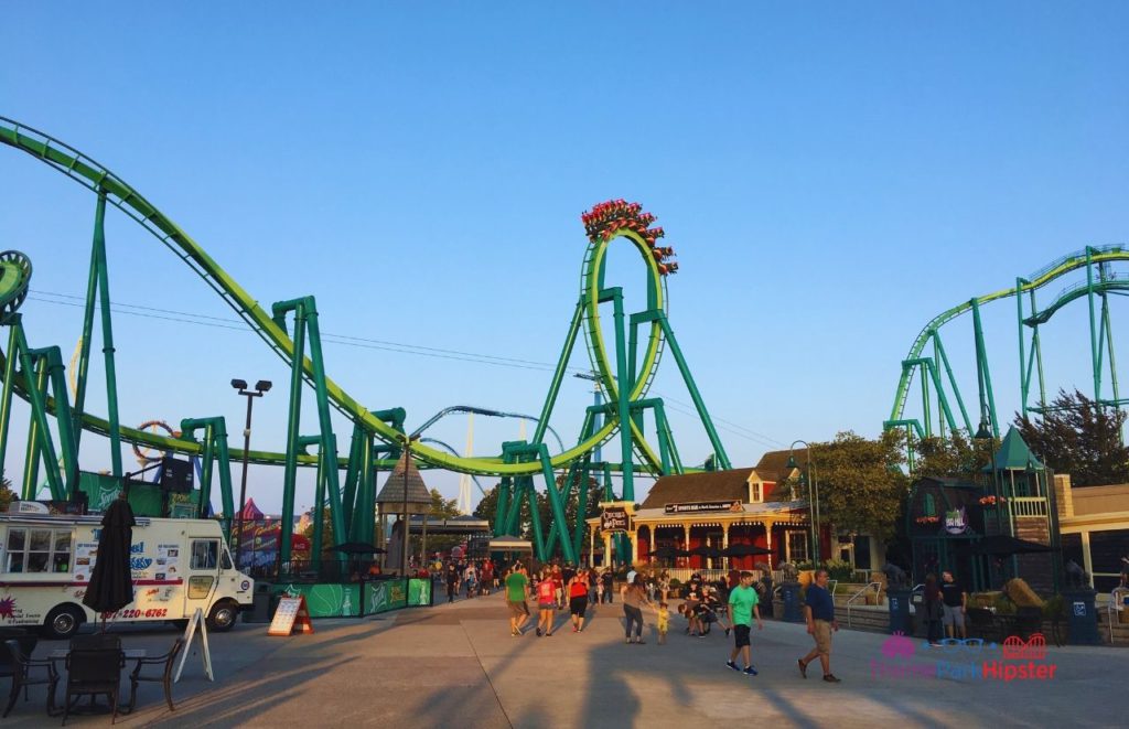 Cedar Point Raptor Roller Coaster going over loop. Keep reading to learn about the best Cedar Point roller coasters ranked!