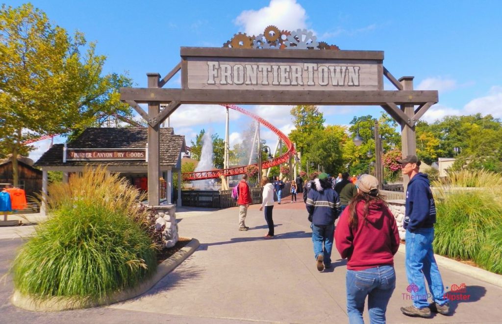 Cedar Point Walking Into Frontier Town with Maverick in the background. Keep reading to learn about the best Cedar Point rides.