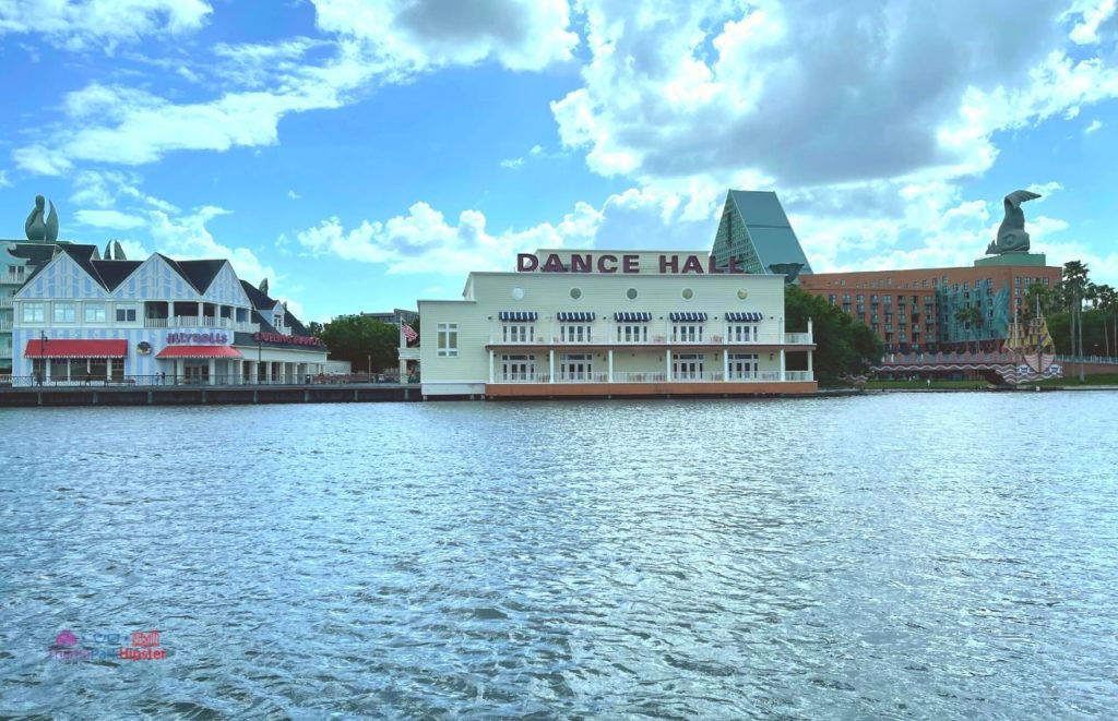 View of Disney's Boardwalk Resort from the Lagoon. Keep reading to learn about the top best fun things to do at Disney World for adults.