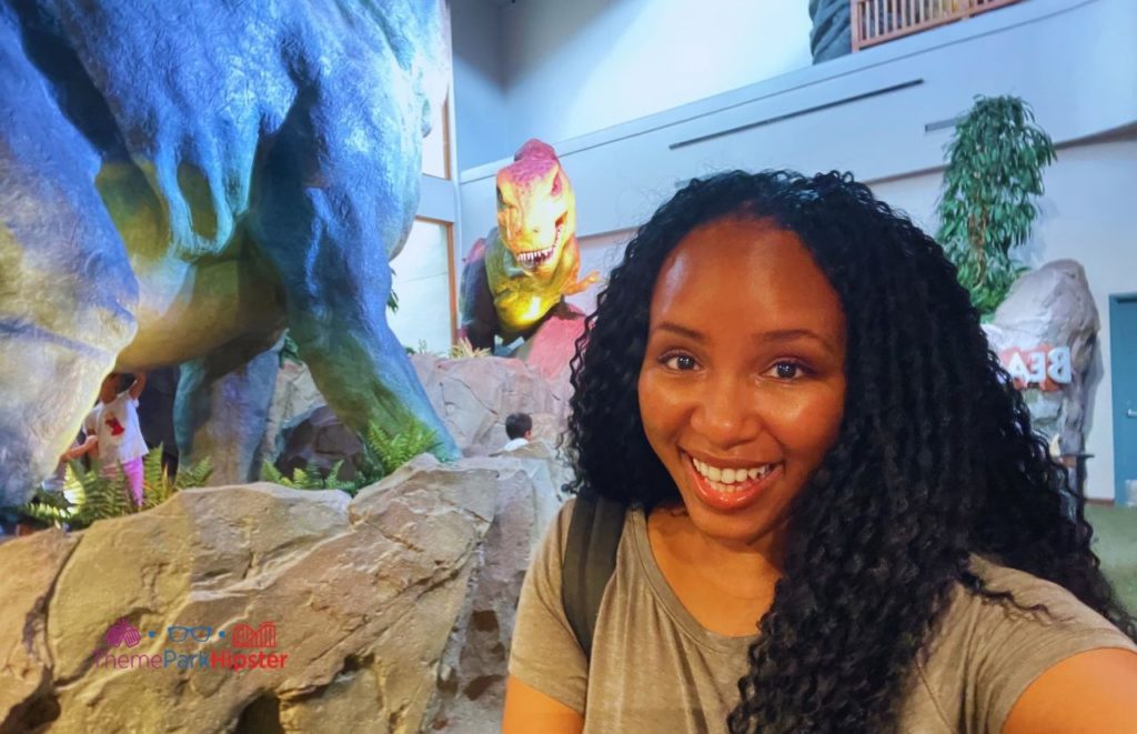 Universal Orlando Resort Jurassic Park Discovery Center with Dinosaurs in Islands of Adventure with NikkyJ. Keep reading to get the benefits of going to theme parks alone and having a solo Orlando, Florida trip.