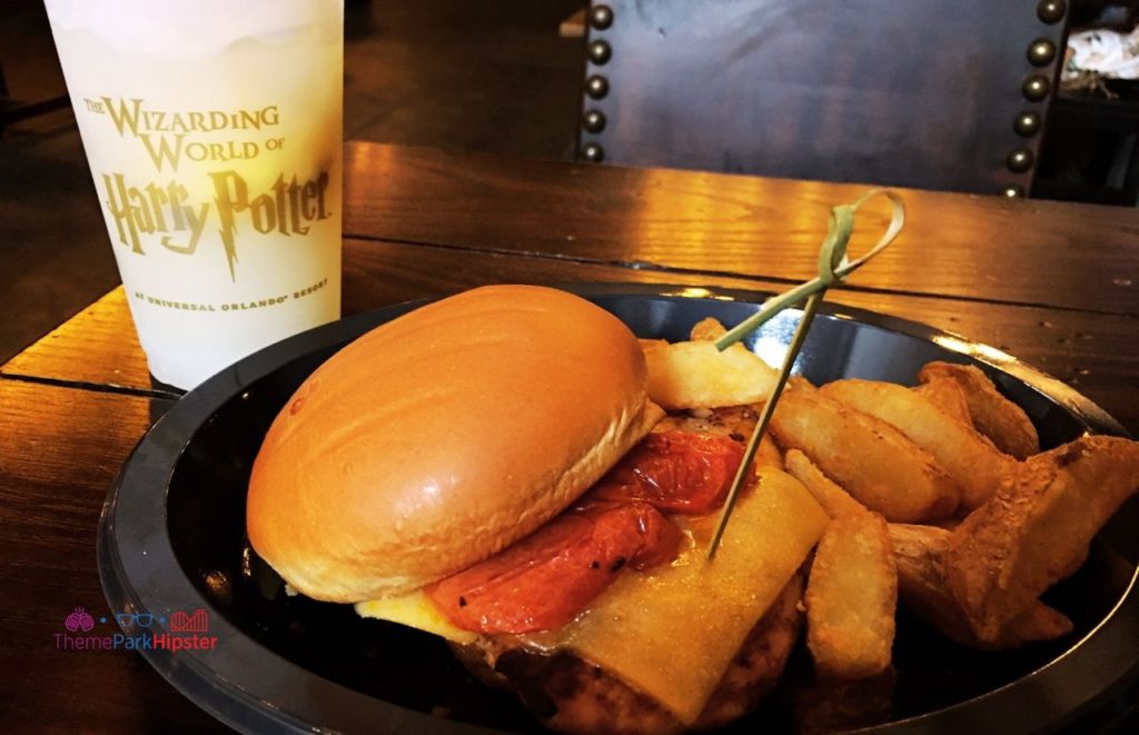 Universal Orlando Resort Lemon drink and chicken sandwich at The Leaky Cauldron of Diagon Alley in the Wizarding World of Harry Potter