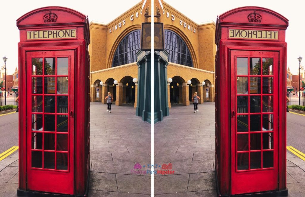 Universal Orlando Resort Red Telephone Booth in front of Kings Cross Station at Harry Potter World Diagon Alley. Your best Harry Potter Itinerary.