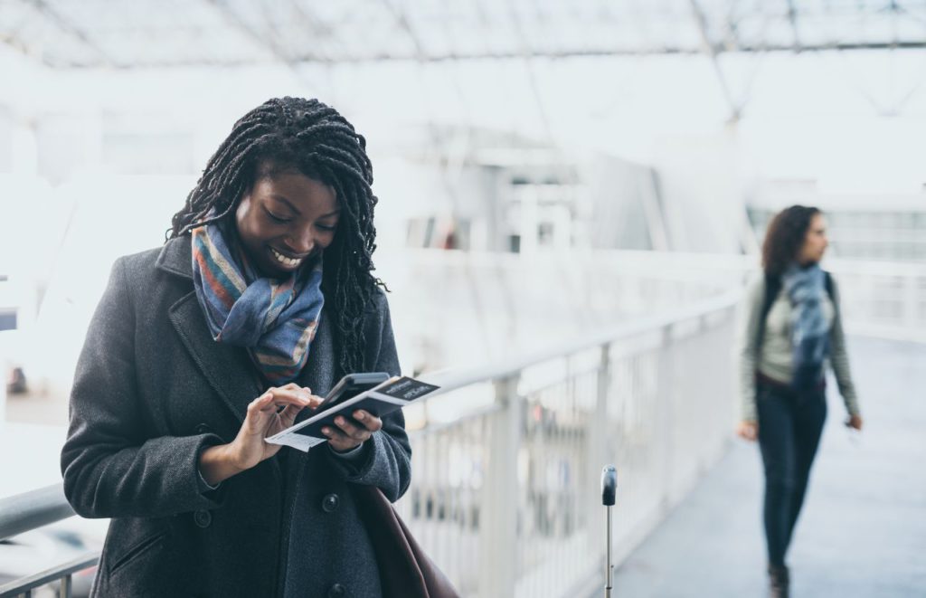 Black Lady Solo Traveler in the Airport. Keep reading for the full female guide to solo travel. 