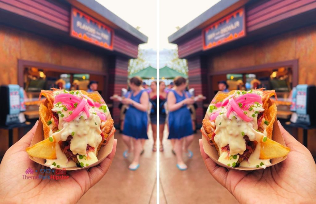 Epcot Food and Wine Festival Flavors of Fire Beef Brisket on Chips. Keep reading to know when is the Slowest Time at Disney World.