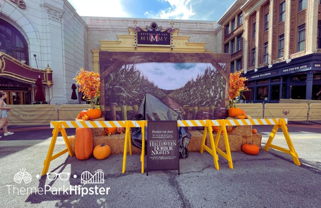 Universal Orlando Resort Revenge of the Mummy behind Halloween Horror Nights Scare Zone with pumpkins at Universal Studios Florida. Keep reading to discover if the Halloween Horror Nights Express Pass is worth it.