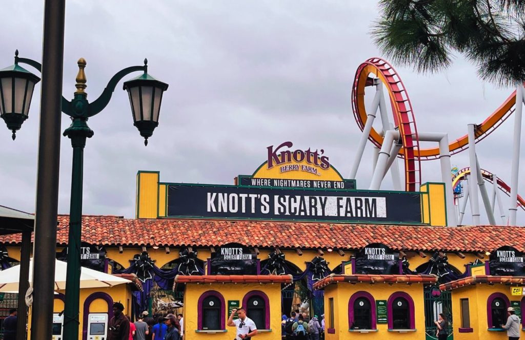 Silver Buller Red Orange Roller Coaster at the Entrances to Knott's Berry Farm at Halloween 2024 Knott's Scary Farm. Keep reading to learn about Knott's Berry Farm Halloween.