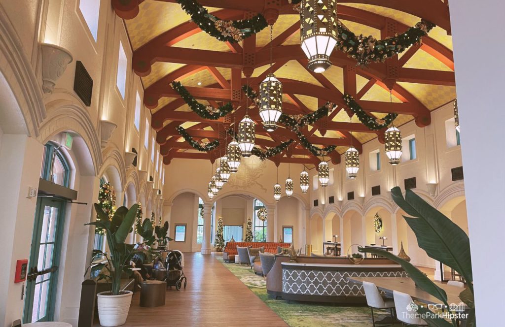 Disney Coronado Springs Christmas Trees in the Lobby. Keep reading to learn more about your Disney Christmas trip and the Disney Christmas decorations.