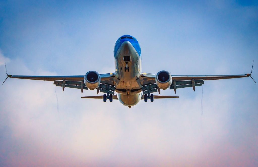 Plane landing at John Wayne Airport. Keep reading to learn what the best airport for Disney is. LAX or John Wayne