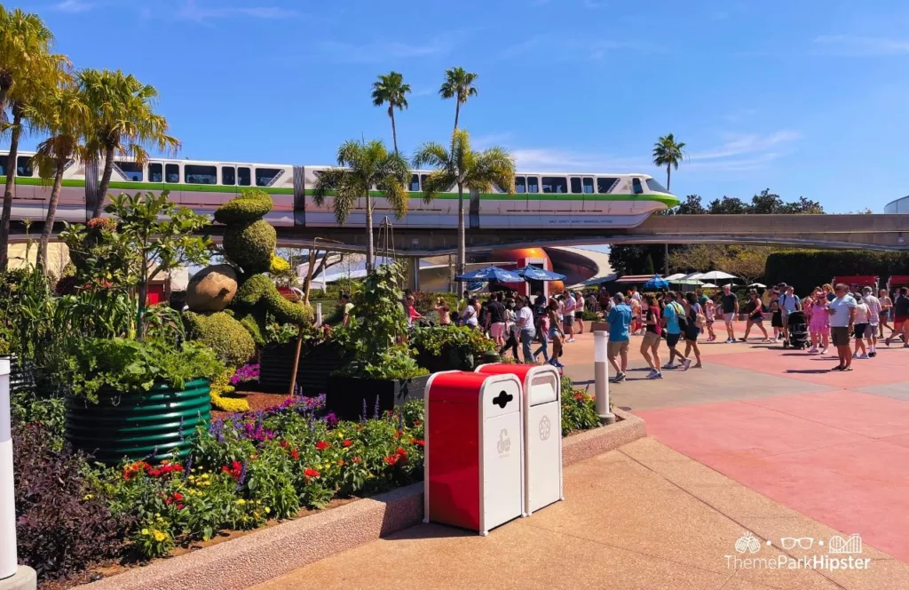 Epcot Flower and Garden Festival topiary with Disney World monorail going by