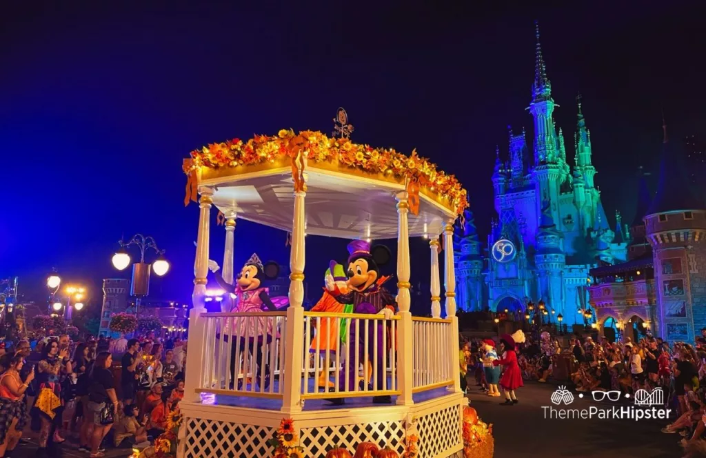 Mickey's Not So Scary Halloween Party at Disney's Magic Kingdom Theme Park Boo to You Halloween Parade in front of Cinderella Castle with characters Mickey and Minnie Mouse