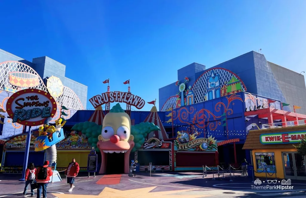 2024 Universal Studios Hollywood Simpsons Land Springfield USA Krustyland Ride and KwikEMart. Keep reading to get the full guide on which is better Disneyland vs Universal Studios Hollywood.