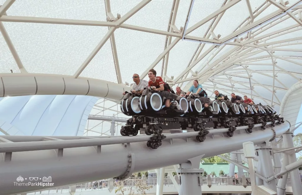 Tron Lightcycle Run at the Magic Kingdom in Walt Disney World Resort Florida Tomorrowland roller coaster up close. One of the best rides at Disney World for Genie Plus Lightning Lane.