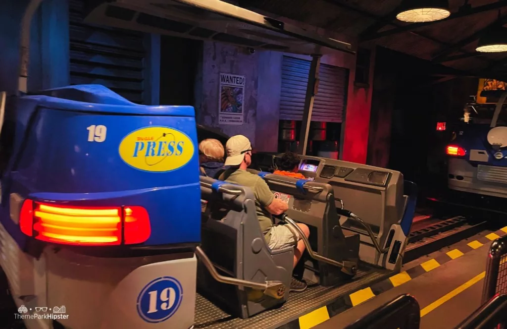 Amazing Adventures of Spider Man Ride with theme park guests in the train car at Islands of Adventure. Keep reading to hear more about Single Rider Lines at Universal Orlando. 