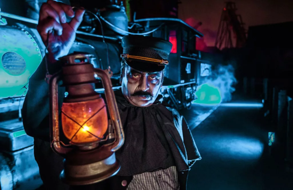 2023 Knott's Scary Farm at Knott's Berry Farm in California Ghost Town Train Conductor Scare Zone