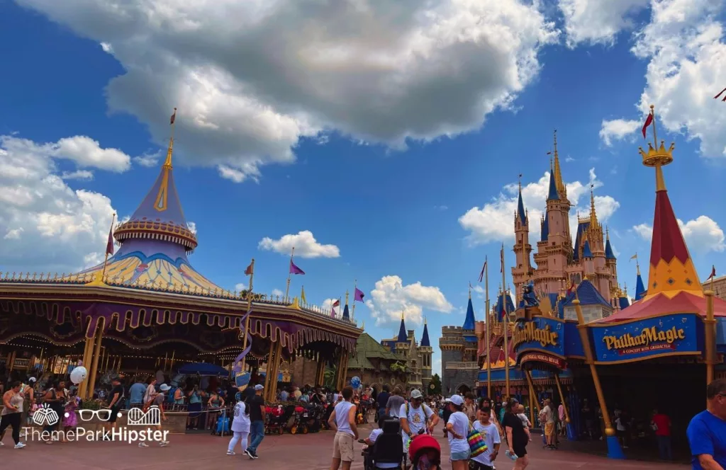 Disney Magic Kingdom Theme Park Fantasyland Carousel Ride and Cinderella Castle. Keep reading to learn how to do Disney World on a budget and save money.