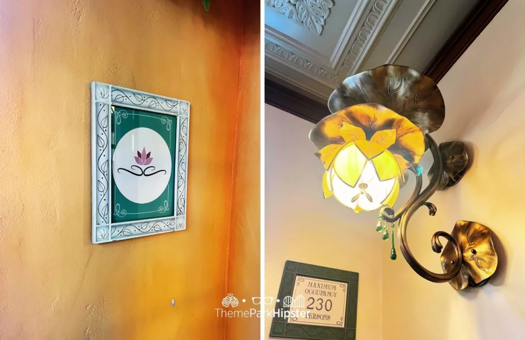 Princess and the Frog Tiana's Palace Restaurant at Disneyland with decor touches of lily pad art and lighting fixture. Keep reading to discover more about Tiana’s restaurant.