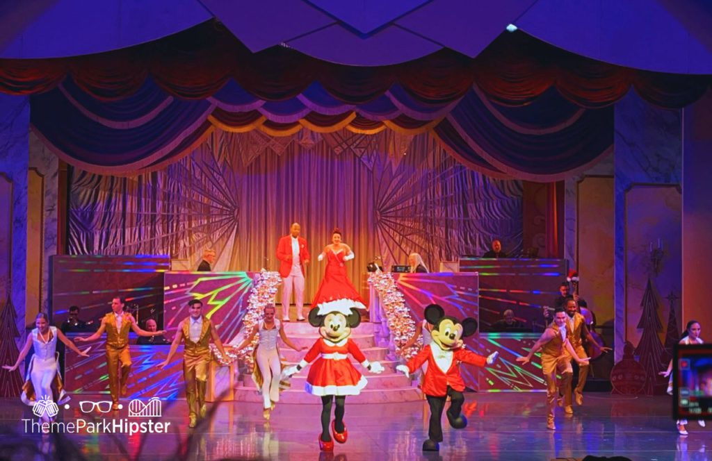 Disney Holidays in Hollywood Show with Minnie and Mickey Mouse. Hollywood Studios Jollywood Nights Christmas Celebration. Keep reading to learn How to Find the BEST Disney Travel Agent and Why You NEED One!